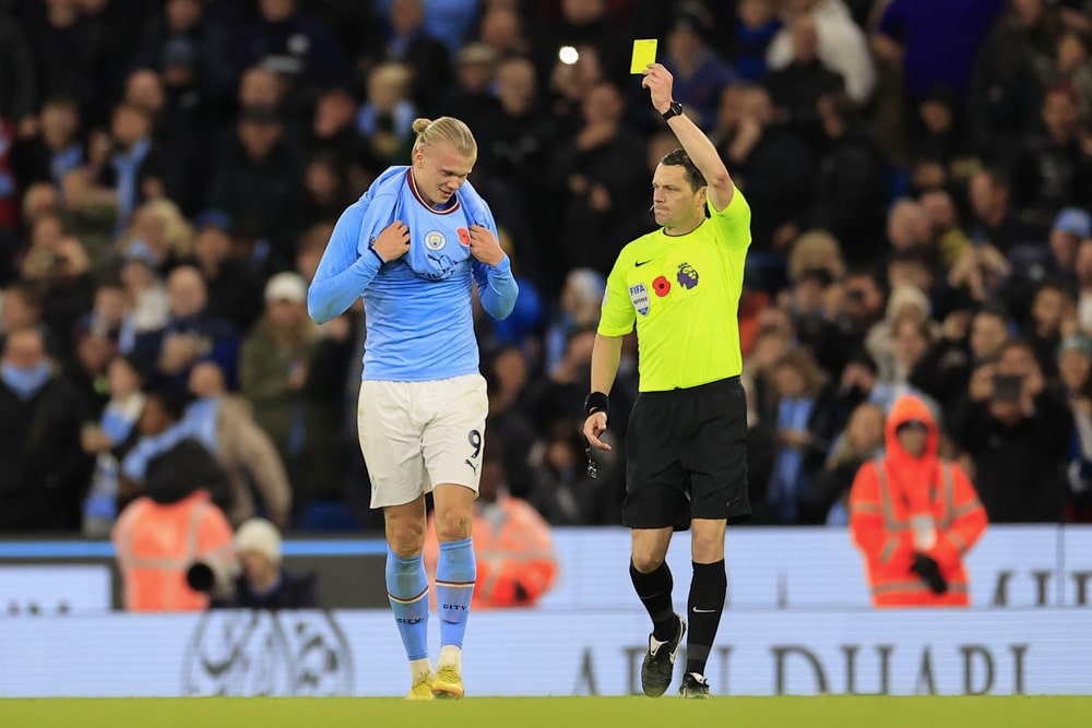 What is a yellow card in football?